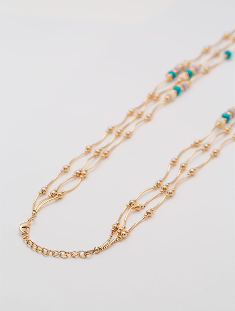 COLLAR MULTI-HILO EN COLOR ORO ROSA ÚNICA