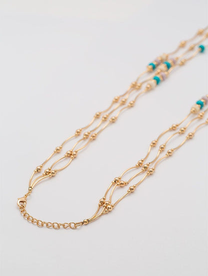 COLLAR MULTI-HILO EN COLOR ORO ROSA ÚNICA