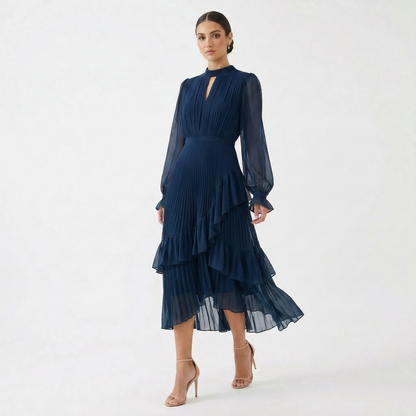 Mariana - Vestido Plisado con Mangas Fluidas y Volantes Asimétricos
