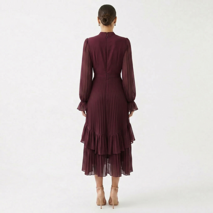 Mariana - Vestido Plisado con Mangas Fluidas y Volantes Asimétricos