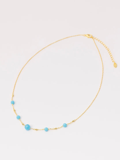 COLLAR ABBEY EN ORO Y PIEDRAS TURQUESA