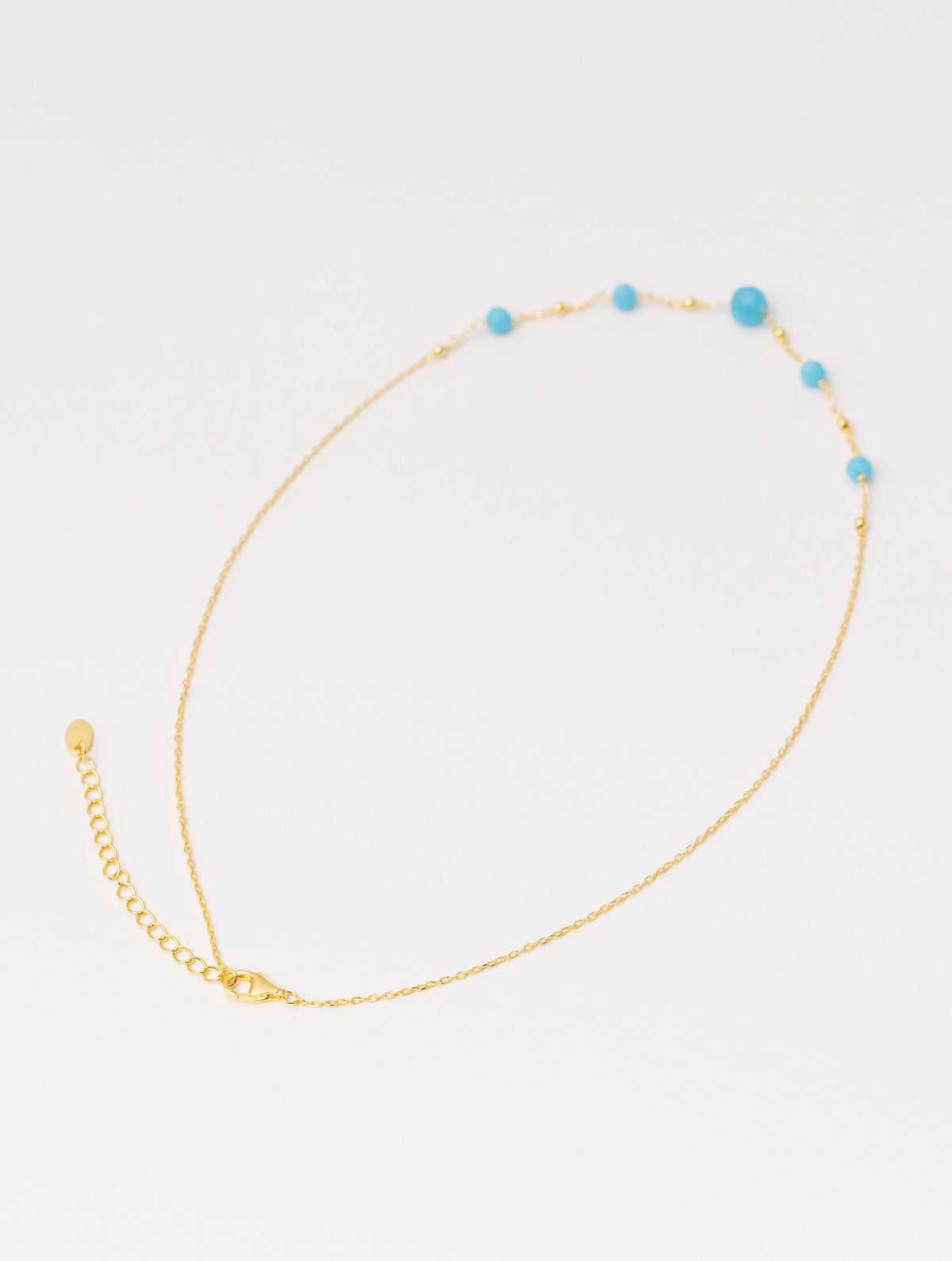 COLLAR ABBEY EN ORO Y PIEDRAS TURQUESA