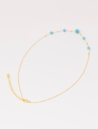 COLLAR ABBEY EN ORO Y PIEDRAS TURQUESA