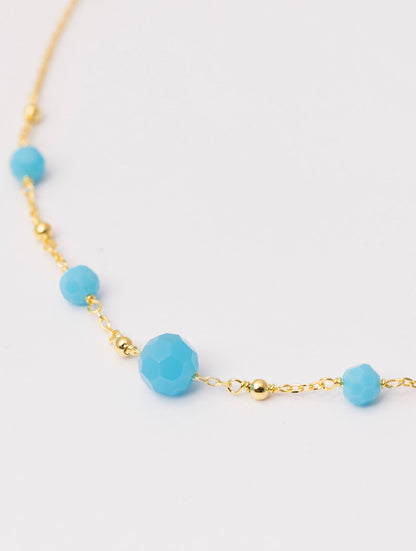 COLLAR ABBEY EN ORO Y PIEDRAS TURQUESA