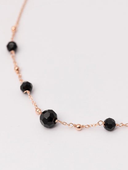 COLLAR ABBEY EN ORO ROSA Y PIEDRAS NEGRAS